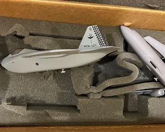 Collectible model airplane PacMin X32 that was designed for the Joint Strike Fighter Competition, accompanied by its fueling jet.  Still in original shipping box!   Better photo will be added.  