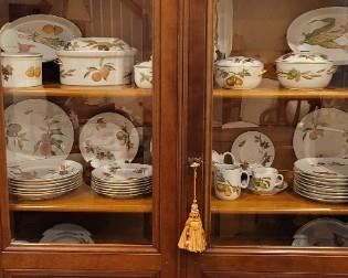 Grange four-shelf beveled glass-front cabinet with Royal Worcester Evesham Gold china displayed