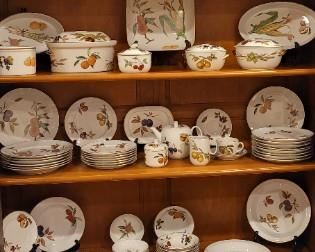 interior of Grange cabinet with 101 Royal Worcester Evesham Gold displayed