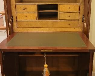 interior of Grange Secretary with leather lined fold down desk and bottom cabinet