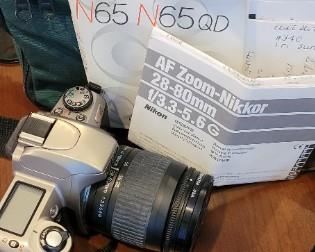 Nikon N65 camera with carrying case, manual, with Nikkor 28-80 mm lens
