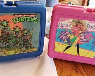 Ninja Turtles and Barbie lunchboxes