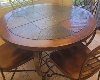 nearly new, very nice dinette table and four chairs