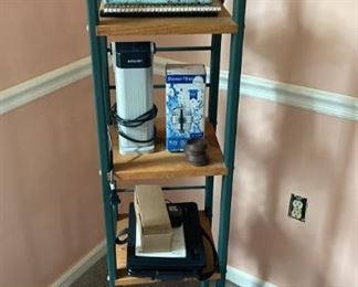 Unique shelving unit, high-powered work light, etc.