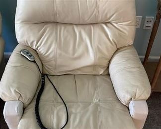 White leather recliner, one of two. White leather ottoman also available
