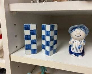 Checkered salt and pepper shakers, one of two of a different set of salt and pepper shakers