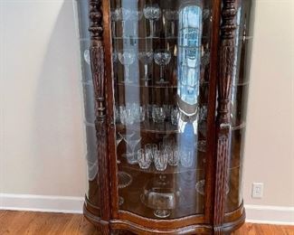 Antique Curved Front Curio with Carved Feet and Lion Head Accents