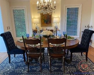 Antique Large Claw Foot Tiger Oak Table with Antique Cane Chairs and Tufted Upholstered Chairs