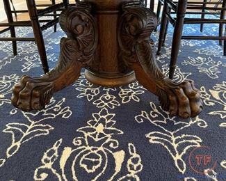 Antique Large Claw Foot Tiger Oak Table with Antique Cane Chairs and Tufted Upholstered Chairs