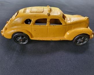 Cast iron yellow taxi.