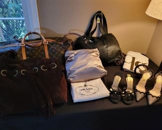 Louis Vuitton, Prada and Michael Kors hand bags. Chanel and Christian Louboutin shoes.