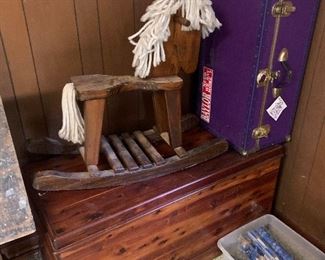 cedar chest; hand made rocking horse; foot locker