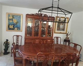 Rosewood dining table and 8 chairs