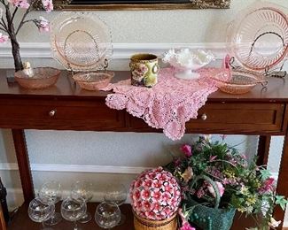 Console table, pink depression glass