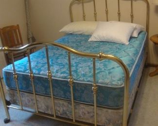 Brass bed w full size mattresses