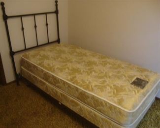 Like new twin bed with iron headboard