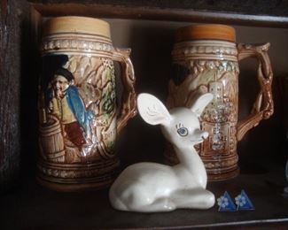 Steins and porcelain deer