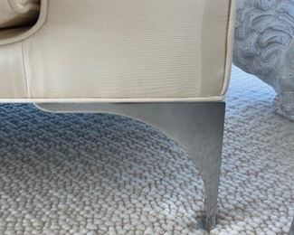 Leg of one of the pair of sofas