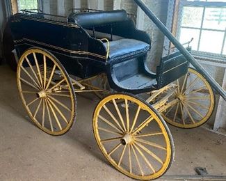 Late 1800’s Nanny Buggy. It has seats in the back for the children to ride while the nanny rode up front with the driver.   This was told to me by the family.  