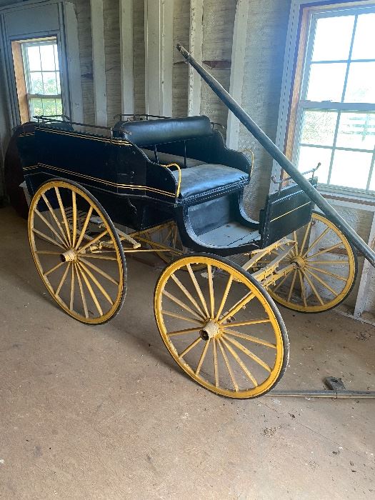 Late 1800’s Nanny Buggy. It has seats in the back for the children to ride while the nanny rode up front with the driver.   This was told to me by the family.  