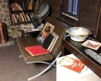 One of a pair of aluminum Barcelona chairs with vinyl cushions