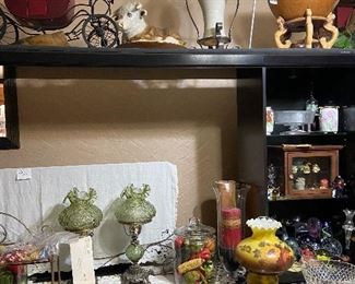 A matching set of Fenton lamps - so beautiful not to mention that ceramic bull platter on the top shelf next to the stagecoach  .... and how about that wood bowl