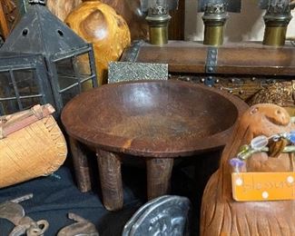 Take a look at the wooden bowl, antique handcuffs along with the jail cell key