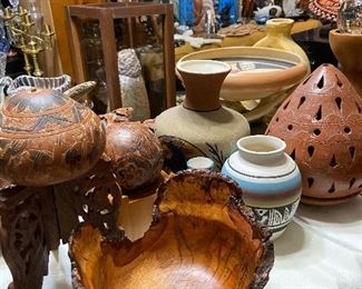 We have two live edge wooden bowls and lots of Navajo pottery
