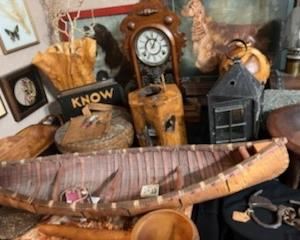 Burl wood vases and numerous other carved wood pieces