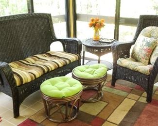 Wicker loveseat and chair, table. Foot stools & rugs