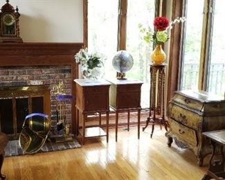 Brass log holder and brass fireplace tool set, globe. Antique clock from England.