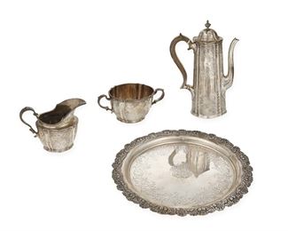 3006
A Tiffany & Co. Sterling Silver Coffee Service
Circa 1892-1902, directorship of Charles L. Tiffany
Marked: Tiffany & Co. / 9480 Makers 7541 / Sterling Silver / 925-1000 / T; Plate variously numbered: 3765 6089
Each decorated with chased floral wreaths and bouquets, comprising a coffee pot (8.75"), a sugar bowl (2.5"), a creamer (3.75"), together with a complimentary designed plate (10"), 4 pieces
39.55 oz. troy approximately
Estimate: $1,000 - $1,500