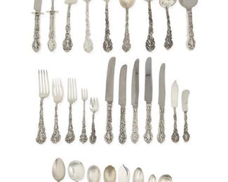 3016
A Gorham "Versailles" Sterling Silver Flatware Service
Fourth-Quarter 19th Century
Each marked for Gorham and sterling
Designed 1888 by F. Antoine Heller, comprising 8 hollow-handled Old French dinner knives (9.625"), 5 hollow-handled Old French place knives (8.75"), 3 hollow-handled New French place knives (9.375"), 8 butter spreaders (5.75"), 1 master butter knife (6.625"), 9 dinner forks (7.75"), 11 luncheon forks (6.75"), 8 Old Style salad forks (6.75"), 8 oyster forks (5.875"), 8 small ice cream forks (4.875"), 10 teaspoons (6"), 8 five o'clock spoons (5.125"), 8 oval soup/dessert spoons (7.125"), 8 gumbo spoons (6.75"), 8 bouillon spoons (5"), 1 table/serving spoon (8.5"), 1 pierced table/serving spoon (8.5"), 1 large jelly spoon (7.25"), 1 jelly server (6.25"), 1 sugar spoon (6.125"), 1 sugar shell spoon (6.125"), 1 sugar tongs (4"), 1 gravy ladle (6.75"), 1 cream ladle (5.75"), 1 medium cold meat serving fork (8.125"), 1 hollow-handled pie server (10.125"), 1 hollow-handle