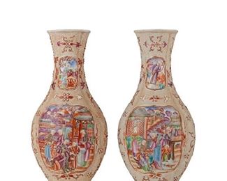 3027
A Pair Of Chinese Rose Mandarin Porcelain Vases
Late 19th/Early 20th Century
Each famille rose porcelain vase with a Rose Mandarin pattern, gilt highlights, and polychrome enamel decoration centering figural medallions to each side against a stipple textured ground with flowers, 2 pieces
Each: 10.75" H x 5" W x 3" D
Estimate: $800 - $1,200