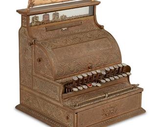 3038
A National Cash Register
Late 19th/Early 20th Century
Marked: National Cash Register Co. Dayton, Ohio, U.S.A.; numbered: 38417
The brass cash register with wood lined drawer and a modern "Call Again" top sign
22" H x 15.5" W x 15.5" D
Estimate: $500 - $700