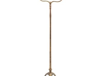 3040
Tiffany Studios
A Harp Floor Lamp, Circa 1902-1919; New York, NY
Signed: Tiffany Studios / New York / 423
The single-light patinated bronze harp base with plain stem and pivoting socket raised on three curved legs with spade feet and gilt finish, electrified
55" H x 12.5" W x 14.25" D
Estimate: $1,000 - $1,500