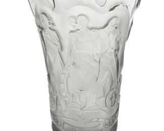 3046
An Art Deco Czech Art Glass Vase
Circa 1930s
The underside with illegible Czech inscription and dated 1937
The fluted, smoked glass vase with concave disc motif centering a frosted sunken relief of three agricultural figures
10.375" H x 7.75" Dia.
Estimate: $800 - $1,200