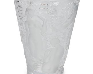 3048
A Lalique "Ondines" Crystal Vase
Circa 1978-Present
With original retail sticker and signed: Lalique ® France
The frosted and translucent lead glass vase with sunken figures against a ground of waves
9.5" H x 7.625" Dia.
Estimate: $800 - $1,200