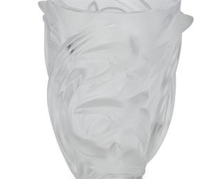 3049
A Lalique "Martinets" Crystal Vase
Circa 1978-Present
Signed: Lalique ® France
The frosted and translucent lead glass vase with haute-relief molded swallows in flight
9.625" H x 8" Dia.
Estimate: $500 - $700