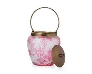 3057
A French Art Glass Biscuit Barrel
Late 19th/Early 20th Century
The tapered jar with acid etched cut-back pink honeysuckle pattern over a textured clear ground fitted with a brass lid and handle
10.25" H x 5.5" Dia.
Estimate: $300 - $500