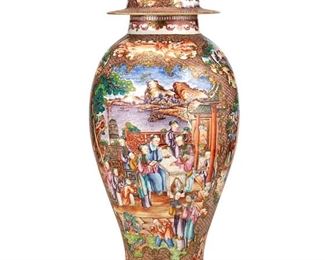3066
A Chinese Rose Mandarin Porcelain Vase
Mid-19th Century
The famille rose porcelain vase with a Rose Mandarin pattern, gilt highlights, and polychrome enamel decoration with staggered figural medallions against a red geometric ground
22.5" H x 9" Dia.
Estimate: $1,000 - $2,000