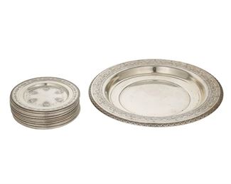 3079
A Group Of American Sterling Silver Dishes
Second-Quarter 20th Century
Serving bowl marked for Wallace and numbered: 3793-9; Each plate marked for Towle and numbered: 53160
Comprising a large Wallace serving bowl (14.25" Dia.) and twelve Towle "Louis XIV" bread plates (each: 6.5" Dia.), 13 pieces
68.43 oz. troy approximately
Estimate: $600 - $900