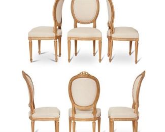 3098
A Set Of Louis XVI-Style Dining Chairs
First-Quarter 20th Century
Each with a carved wood frame and bow topped backs all with new linen upholstery to backs and seats, 6 pieces
Each: 41" H x 20" W x 20" D
Estimate: $2,500 - $3,500