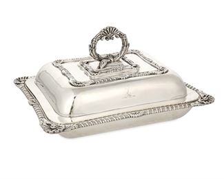 3115
A Georgian English Sterling Silver Vegetable Serving Dish
1810
Marked with English hallmarks for London; maker's mark for Thomas Robins
The rectangular serving dish with reversible handled lid, gadrooned borders, and rocaille motifs
6.5" H x 11.375" W x 9.25" D
73.68 oz. troy approximately
Estimate: $2,000 - $3,000