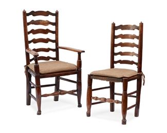 3121
A Set Of Ladder Back Chairs
First-Quarter 19th Century
Each with a wavy ladder back and with rush seat and later-added upholstered herringbone cushion, comprising seven side chairs (each: 40.25" H x 19.25" W x 15" D) and two armchairs (each: 44.5" H x 27" W x 21" D), 9 pieces
Estimate: $800 - $1,200