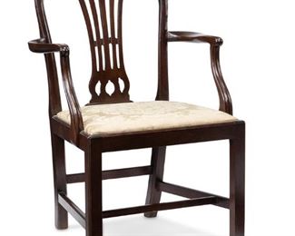 3123
An English Georgian-Style Armchair
Late 19th/Early 20th Century
With carved mahogany frame with pierced backsplat and upholstered cushion
36.25" H x 25.5" W x 22" D
Estimate: $600 - $800