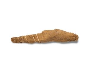 3139
An Ancient Egyptian Mummified Fish
Late Period (circa 664-332 BCE)
Unmarked
Mummified fish wrapped with intricate linen wrappings, believed to be a catfish
8.75" L x 2" W x 1.75" D
Estimate: $500 - $700