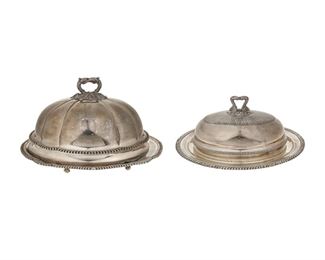 3149
Two English Silver Game Domes
Two pieces:

A large Georgian game dome
1803
Tray marked with English hallmarks for London and maker's mark for William Frisbee; Dome with maker's mark for Robert's, Cadman & Co.; incised "Crowe" to the underside of the tray and interior of dome
The large, lobed silver-plated dome with foliate handle and gadrooned border over a confomingly designed sterling silver footed undertray
14" H x 23.5" W x 17.5" D
152.1 oz. troy approximately

An Edwardian silver-plated game dome
Circa 1906-1912
Tray marked for Barker Brothers and silver plate; further marked: G. Sheppard
The small dome with foliate handle, gadrooned trop, and dashed border over a tray with gadrooned rim and rocaille motifs
8" H x 20" W x 15" D

2 pieces
Estimate: $600 - $800