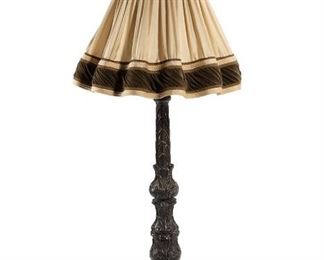 3159
A Spanish Revival-Style Carved Wood Candlestick Floor Lamp
20th Century
The carved wood tripod base with all-over foliate designs surmounted by a faux candle issuing a single light socket and with a contemporary shade, electrified
Base: 66" H x 19" Dia.
Estimate: $600 - $900