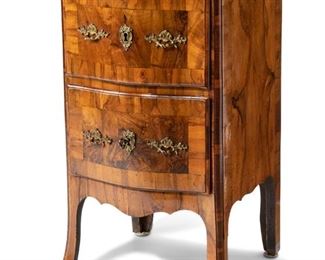 3167
A South German Rococo Walnut Petit Commode
Mid-18th Century
With a serpentine top above a conforming case fitted with a pair of drawers on cabriole legs
34" H x 21" W x 18" D
Estimate: $700 - $900